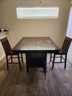 Mesa de comedor extendible con 2 sillas