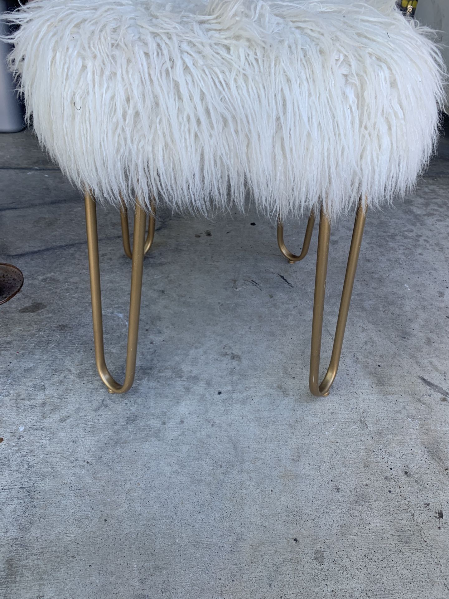 Free- fuzzy stool with gold hair pin legs