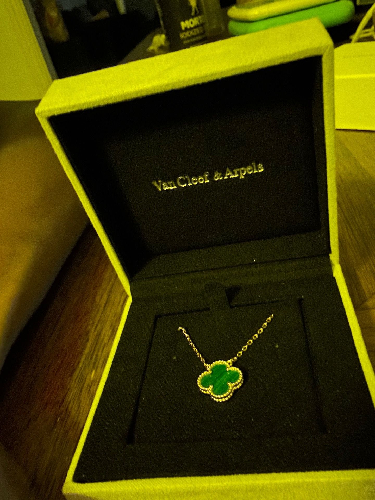 Van Cleef & Arpels Vintage Alhambra Pendant in 18K yellow gold with a green malachite inlay.