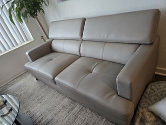 Grey leather love seat sofa