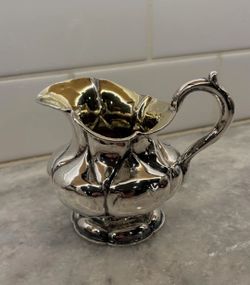 Old Metal Pitcher