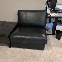 Black Faux Leather Lounge Chair – Modern and versatile, can be used as a standalone chair or as part of a sectional.