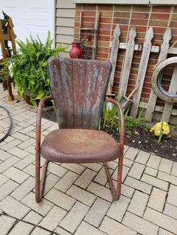 Love this vintage rustic chair...front porch maybe
