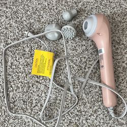 Pink massager with 3 removable heads