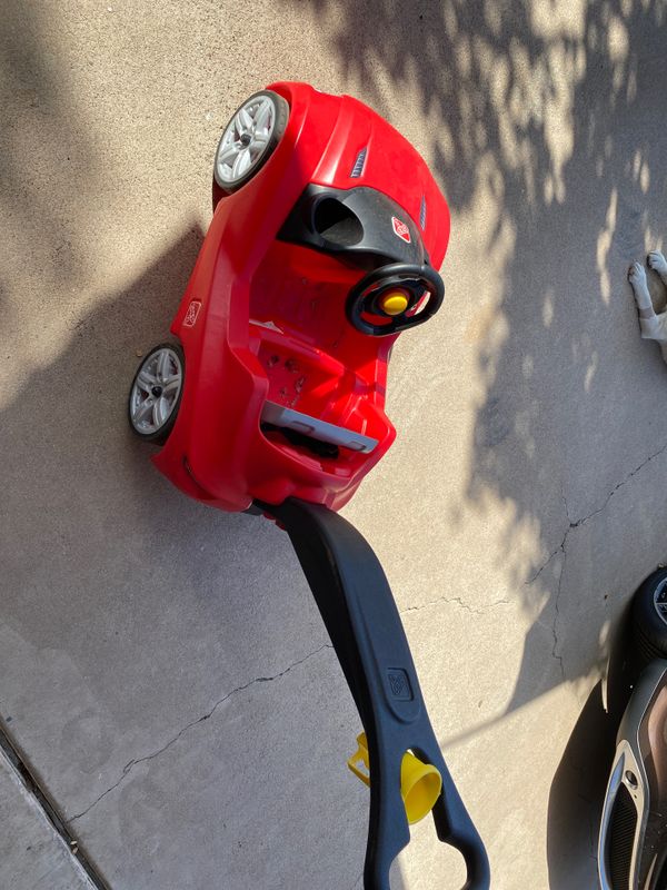 red push car with handle