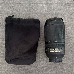 Nikon AF-S NIKKOR 70-300mm f/4.5-5.6G ED VR lens.   	•	 