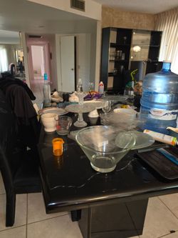 Black dining table with extra leaves