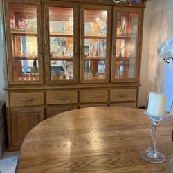 Solid Oak Dining Room Set With 8 Chairs.   Matching Back Lit Hutch