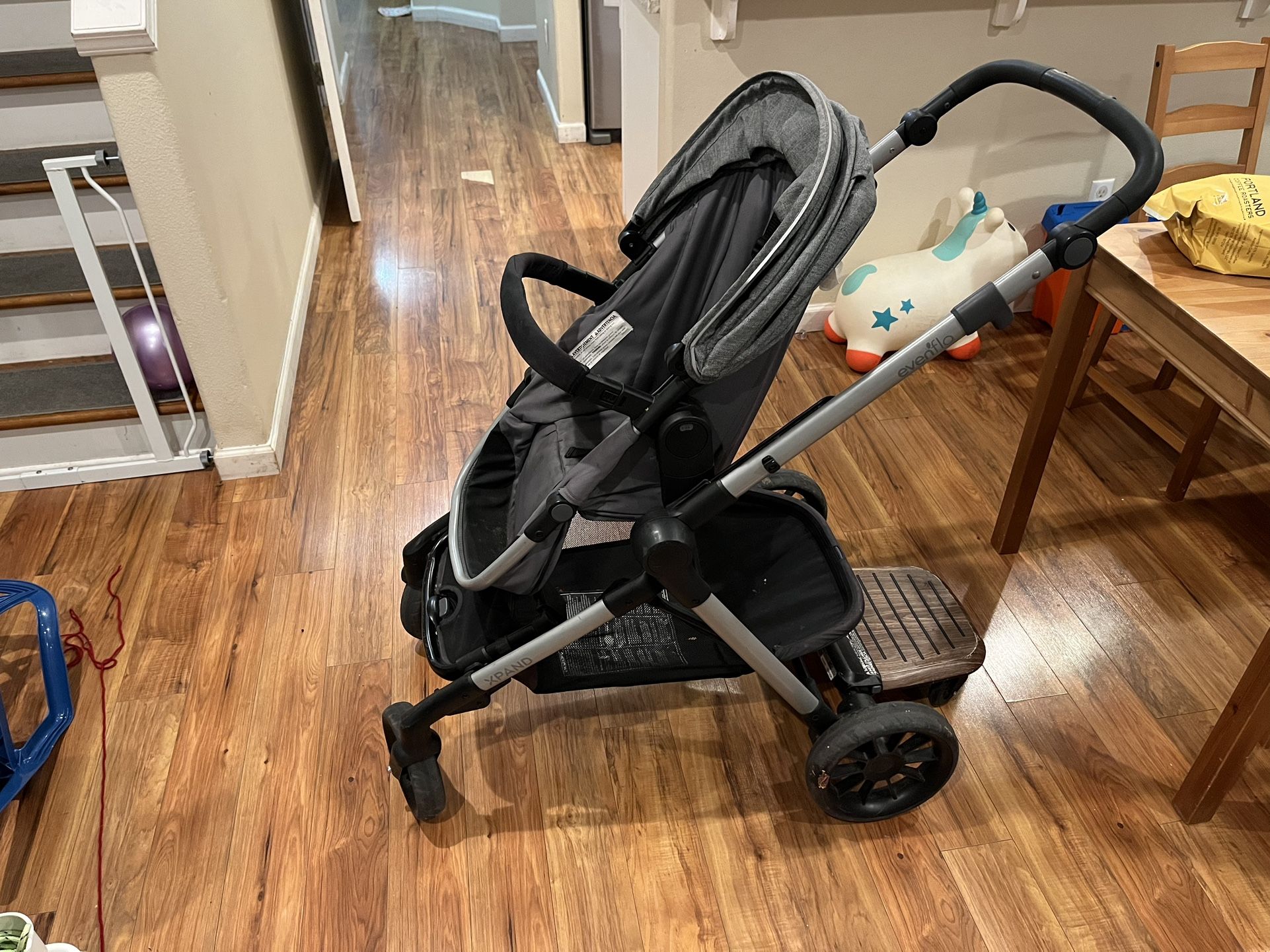 Adjustable Double Stroller With Skateboard Attachment