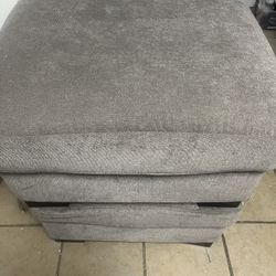 ottoman.  color dark to light grey
