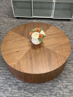 35.5” Brown Modern Round Wood Coffee Table ✨A Beautiful, Stylish Centerpiece  This modern round wood coffee table features a warm brown finish and a 