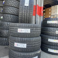 285/45R22 vogue tires white wall with red stripe all season with installation available  we finance 