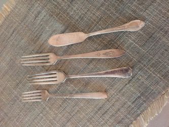 Antique forks and butter knife