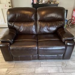 dark brown/dark cherry red electric reclining couch