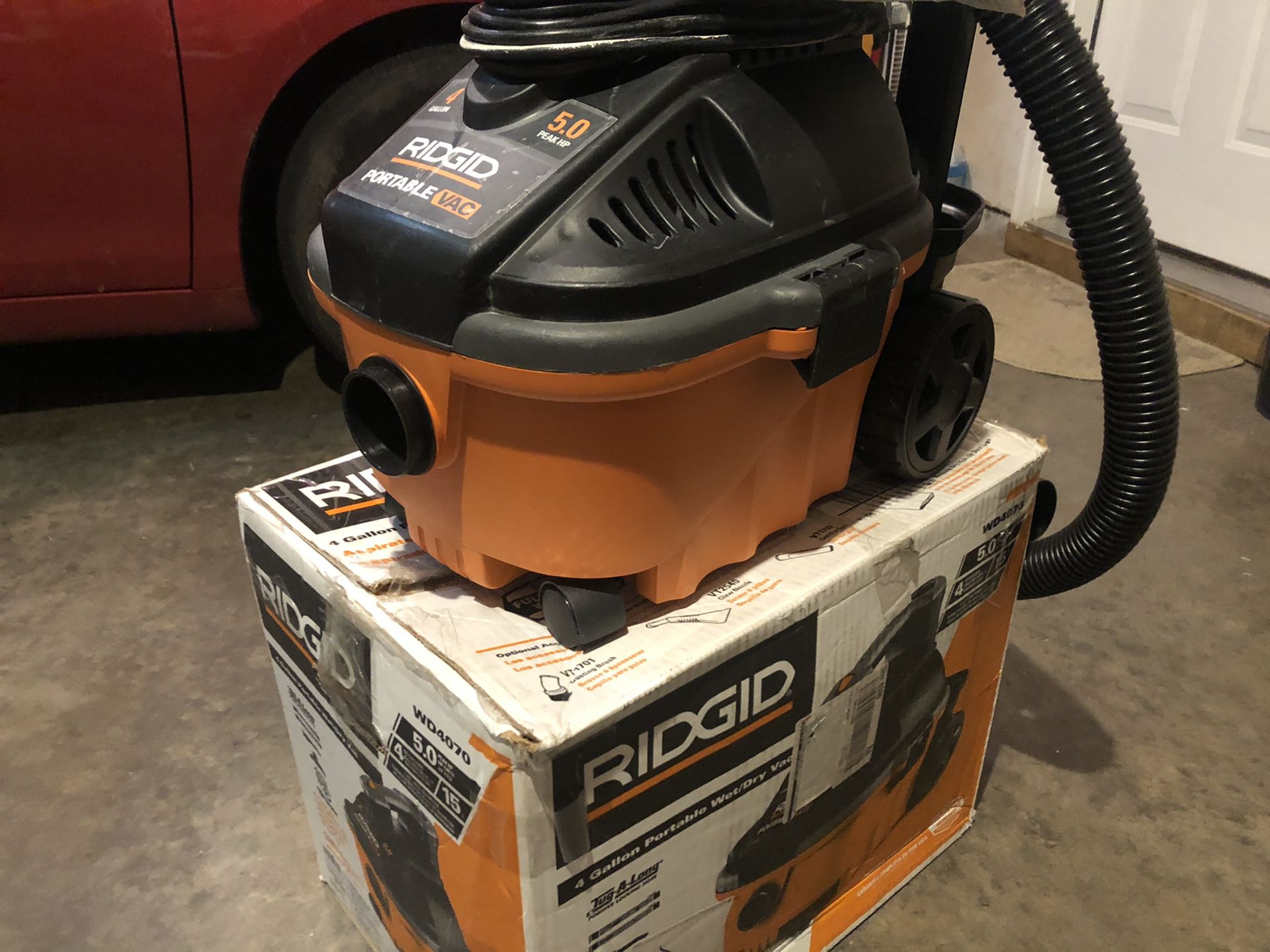 RIDGID 4 Gal. 5.0-Peak HP Portable Wet/Dry Shop Vacuum with Fine Dust Filter, Hose and Accessories