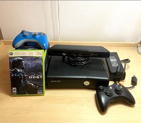 Preowned Xbox 360 including Kinect monitor, 2 controllers, and 10 CD games