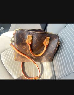 LV Purse  $675