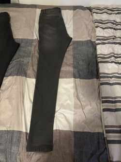 two pairs of skinnies size 28