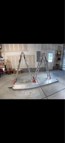 2 Extension Ladders & Aluminum Stage