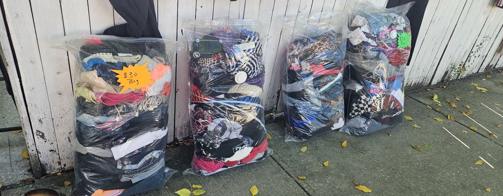 Bags Of Clothes, Shirts, Sweaters, Jeans, Pants, Curtains And Coats/ Jackets