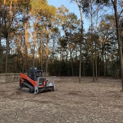 Land clearing, hydro ax, dirt work.