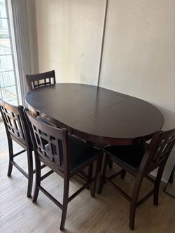 Tall kitchen table with chairs