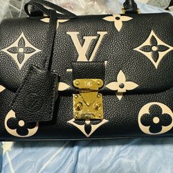 Louis Vuitton Madeleine BB bag in black and beige Monogram Empreinte