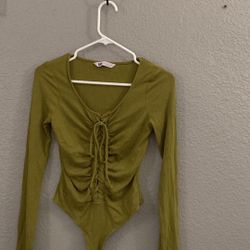 Green women’s long sleeve onesie shirt