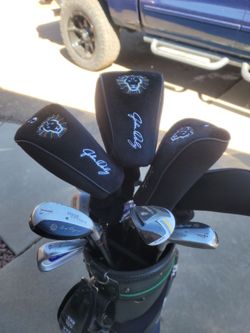 John Daly driver and hybrid set with covers plus Calaway cart bag
