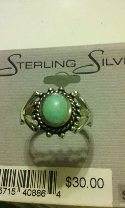 Beautiful sterling silver ring with green stone.