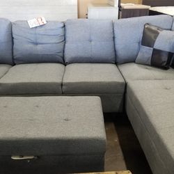 Light Grey Sectional With Storage Ottoman 