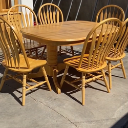 Dining table, chairs, and hutch