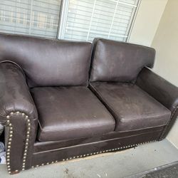 Black Leather Couch ..