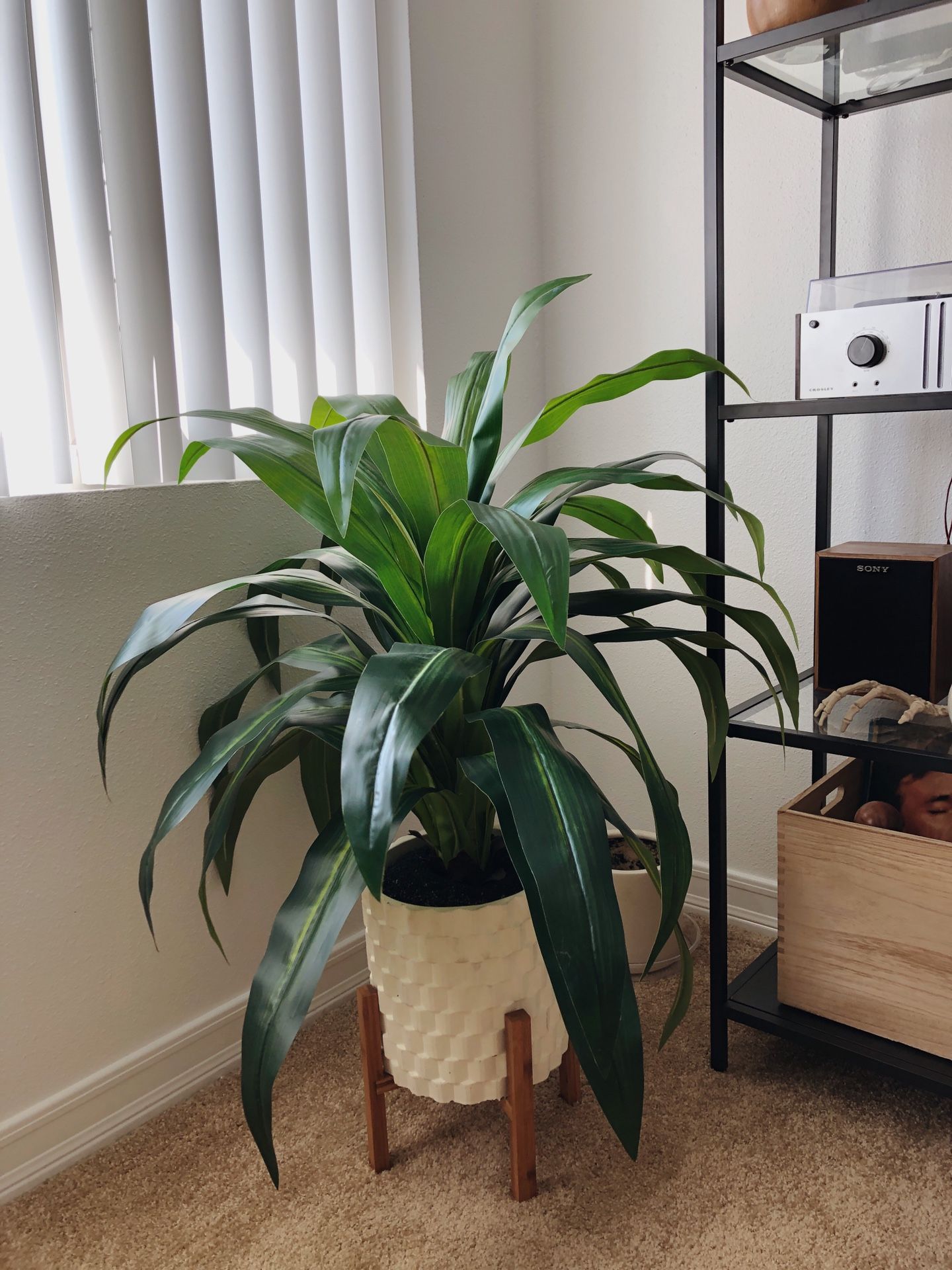 Fake plant in cute modern white pot