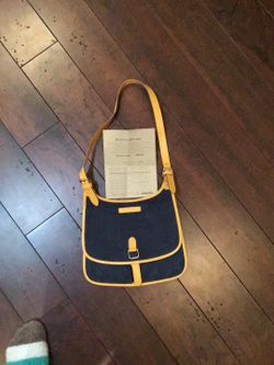 Dooney & Bourke Denim purse yellow leather strap.
