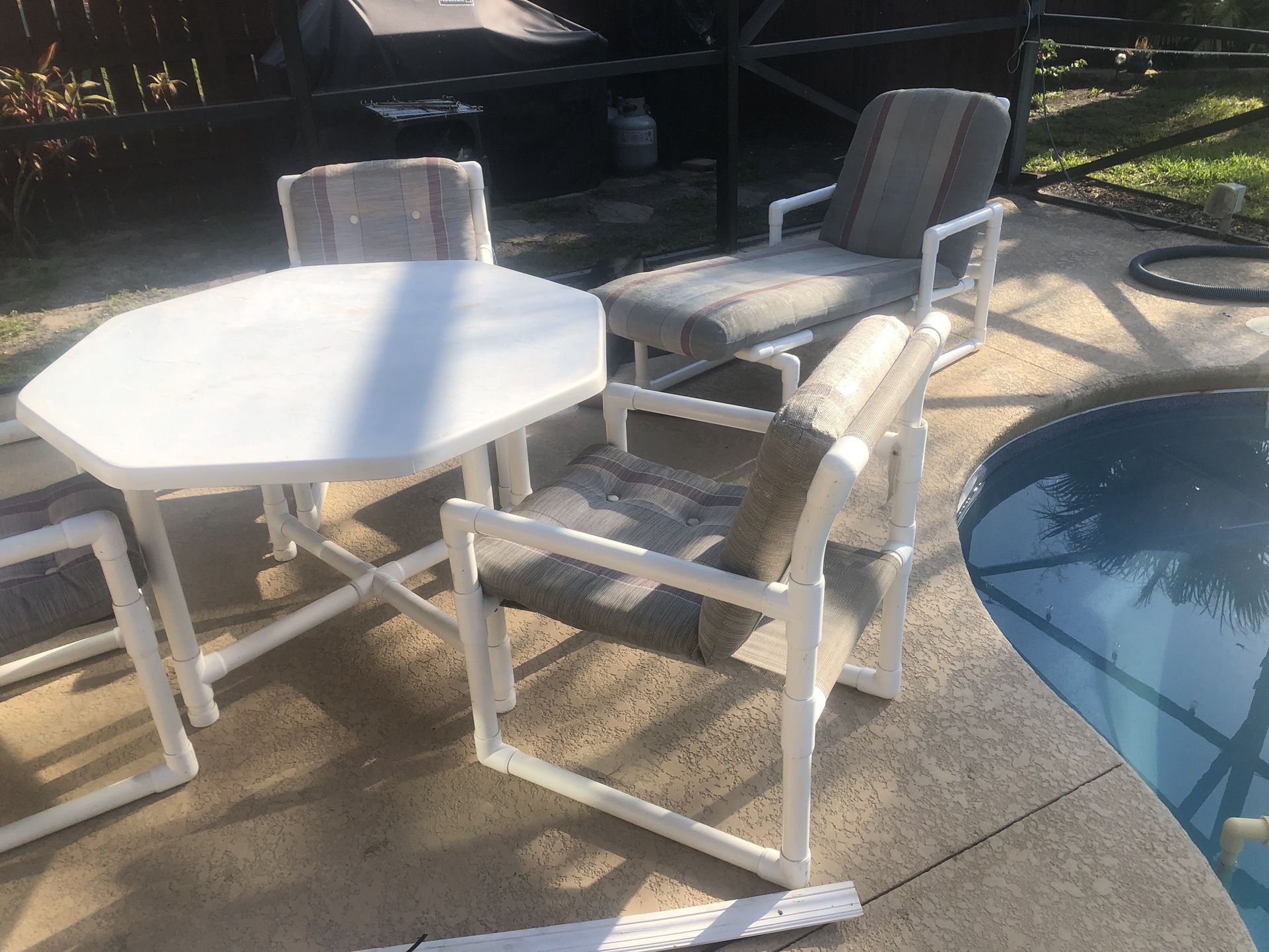 Patio Furniture - White PVC! 4 Chairs And Table- Also a Lounger!!