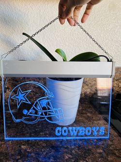 Dallas Cowboys LED Neon Sign, specifically a 3D-engraved acrylic light featuring the team's helmet and logo.