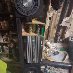 (2) 10" Pioneer Premier subwoofer  and a Performance Teknique  amp