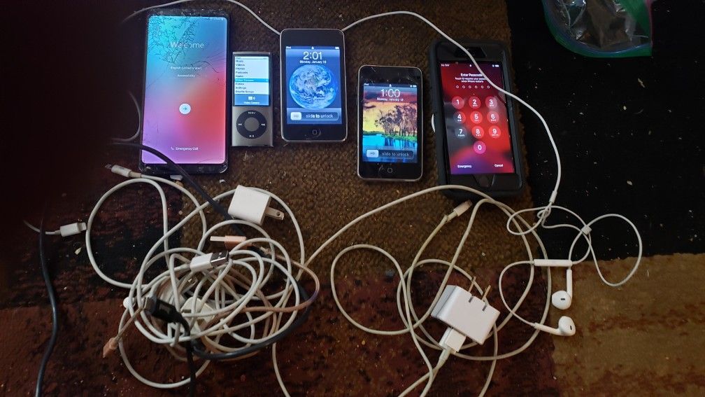5 phone lot lg style 4, 2 original ipod touches, ipod nano with camera' and iPhone s plus cords n headphones