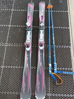 Völkl Essenza Charisma women's all-condition XTD Woodcore XTRA Light skis with Scott 44” ski poles