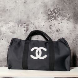 (COA) CHANEL Black/White GP Duffel Bag