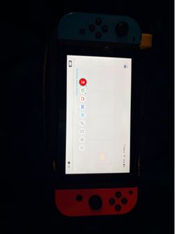 Nintendo switch with 6 games and case