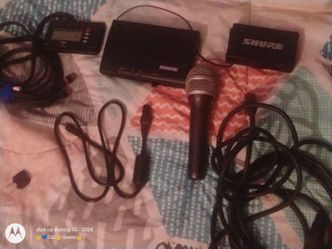 Guitar cords, aux cord, Samsung microphone , SHURE Bothers inc receiver, SHURE Transmitter , Guitar stand . Bundle