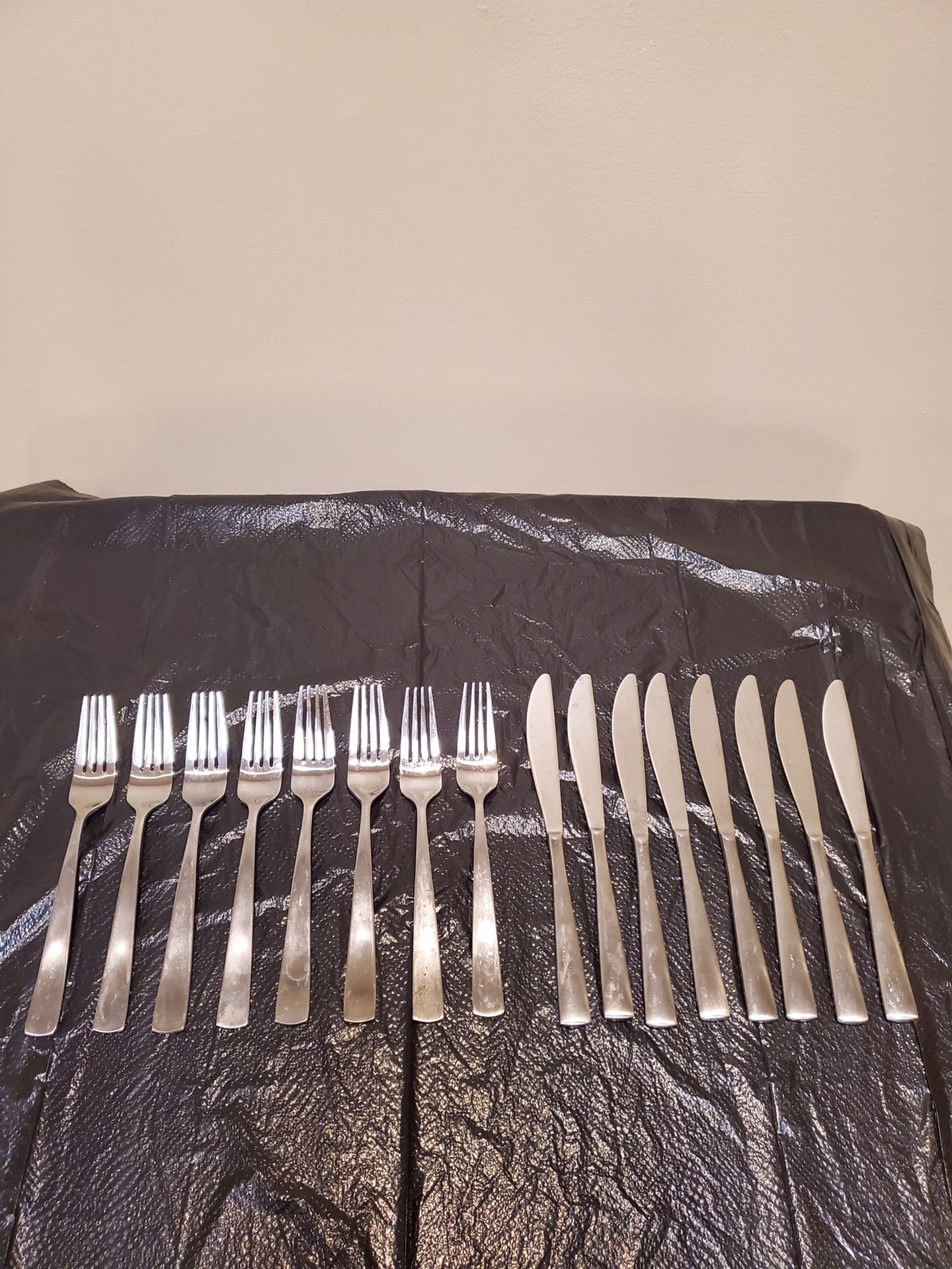 SET of EIGHT (8) STAINLESS FORKS & KNIVES - firm price