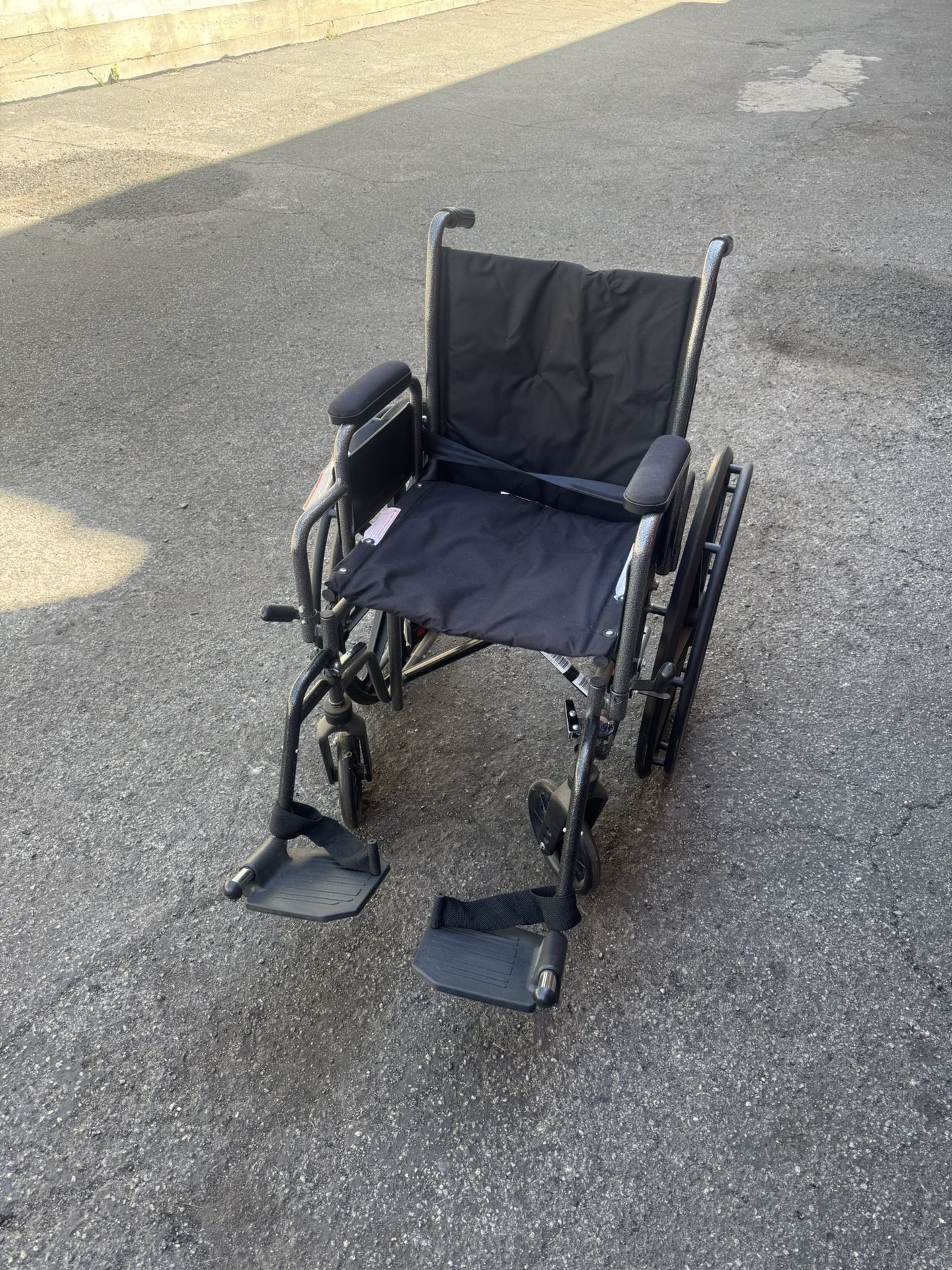 Barely used wheelchair, great condition- light wide seat wheel chair