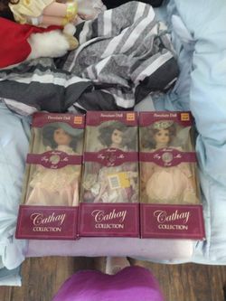 Three Cathay Collection Porcelain Dolls