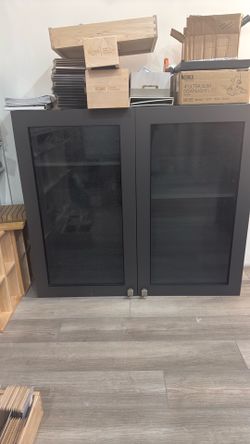 Upper cabinets with seeded glass in steel grey  30” x 30”