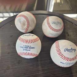 4 used Baseballs