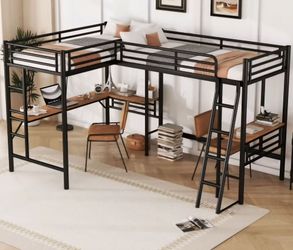 Twin bunk beds over desk
