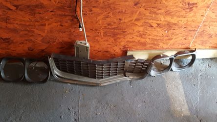 Rx3 headlight bezel / grill